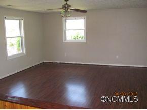 85 Todd Road Clyde, NC 28721 - Photo 3 of 11 an empty room with a window