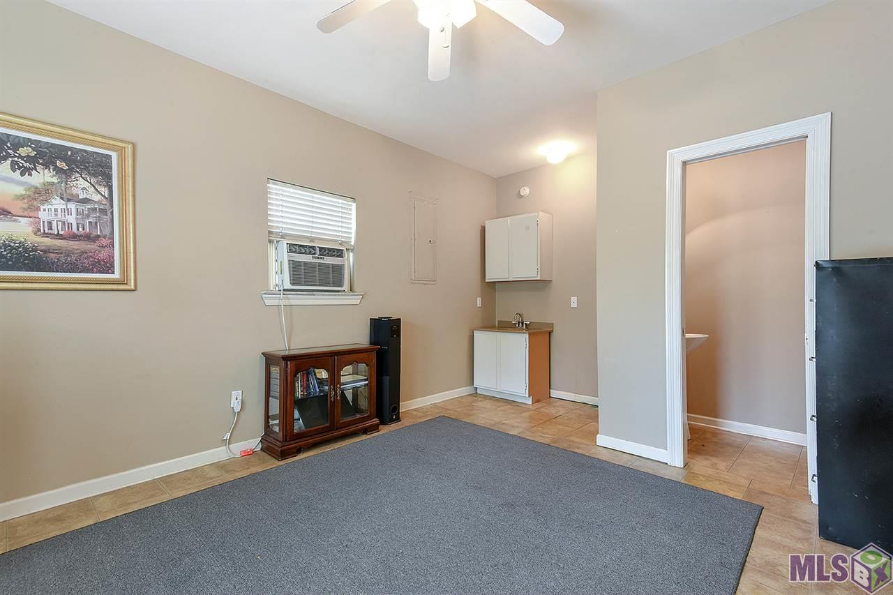 16558 Jay Road Prairieville, LA 70769 - Photo 14 of 16 Pool Room with 1/2 bath