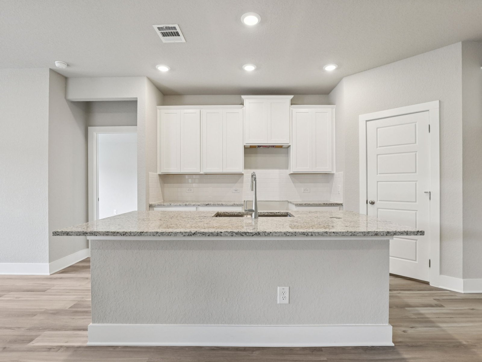 320 Wheel Horse Road Burnet, TX 78611 - Photo 6 of 28 Photo is not of the actual home, but is an inspirational photo of builder’s model home and may depict options, furnishings, and/or decorator features that are not included