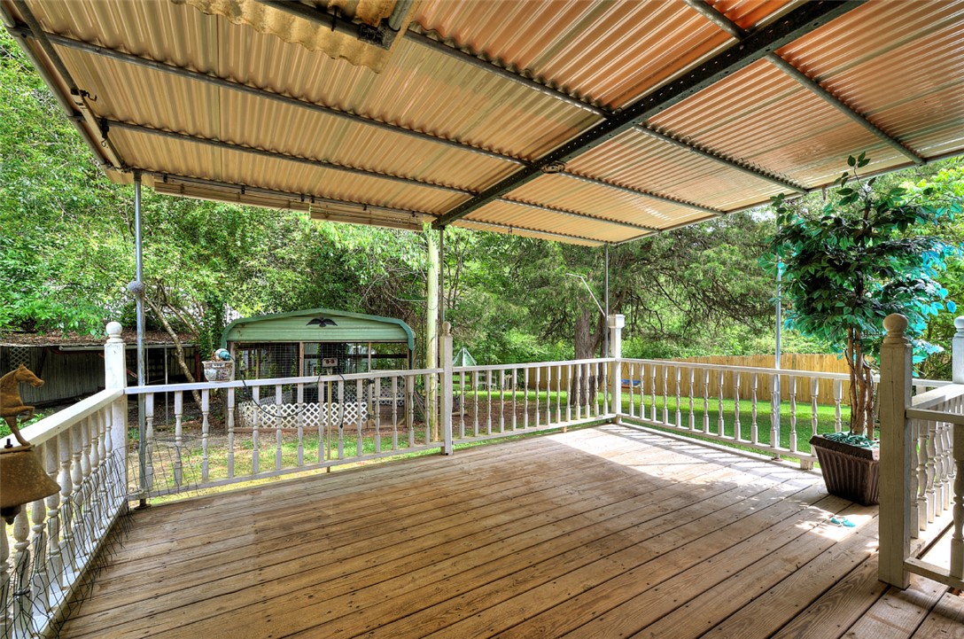 5064 Keowee School Road Seneca, SC 29672 - Photo 46 of 49 This spacious covered deck provides an inviting outdoor living area with views of the expansive yard.