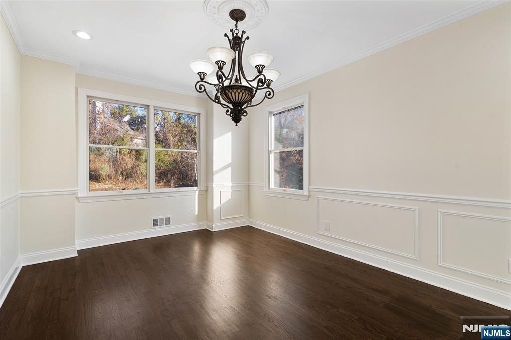 20 Grove Street Boonton, NJ 07005 - Photo 12 of 39 a view of an empty room with wooden floor and a window