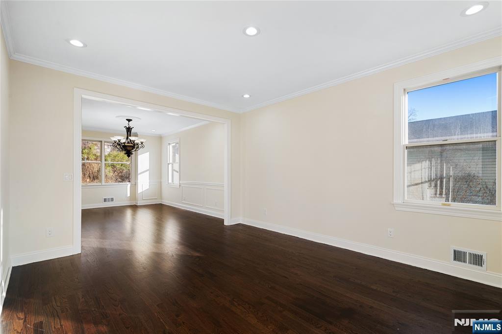 20 Grove Street Boonton, NJ 07005 - Photo 14 of 39 a view of an empty room with wooden floor and a window
