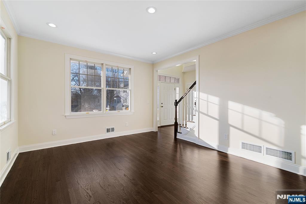 20 Grove Street Boonton, NJ 07005 - Photo 15 of 39 a view of an empty room with wooden floor and a window