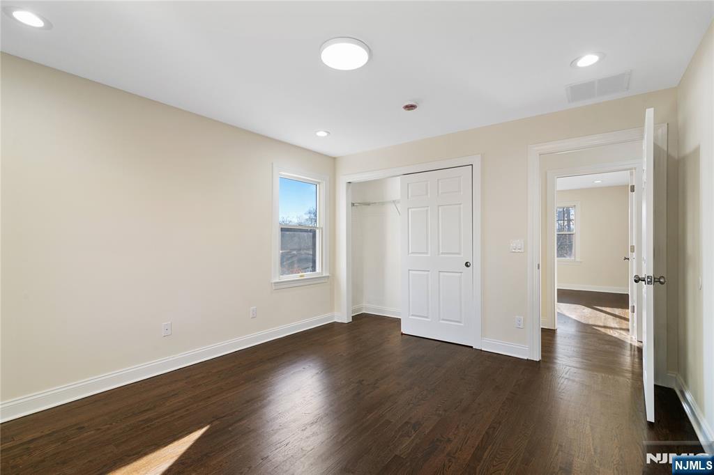 20 Grove Street Boonton, NJ 07005 - Photo 23 of 39 a view of a room with wooden floor and window