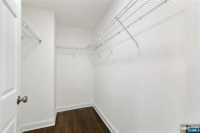 a view of a room with racks on the wall