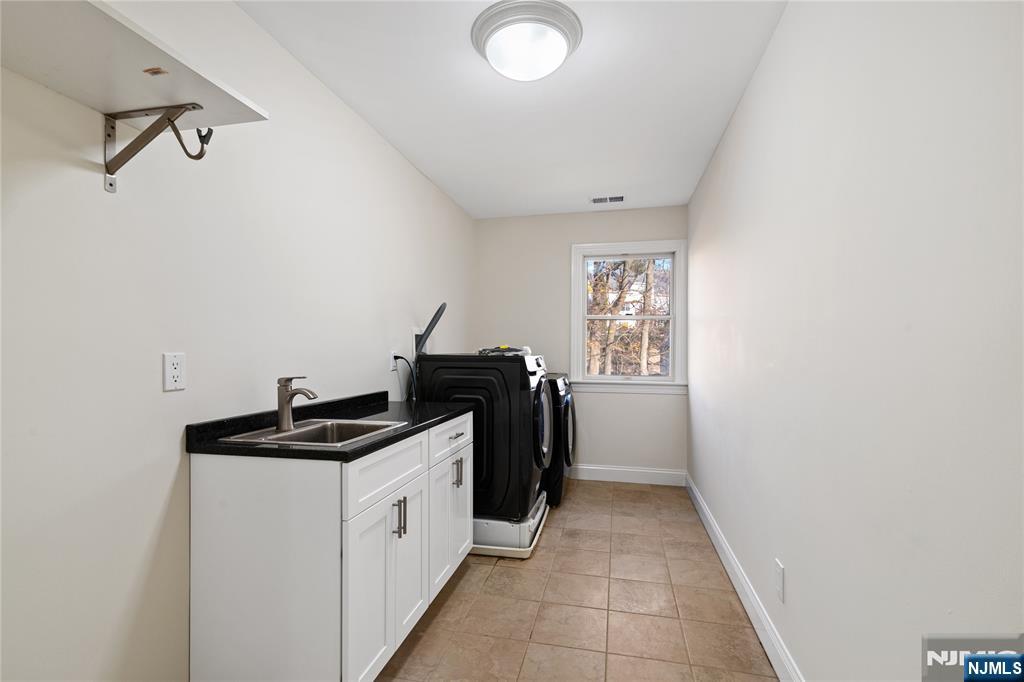 20 Grove Street Boonton, NJ 07005 - Photo 36 of 39 a utility room with dryer and washer