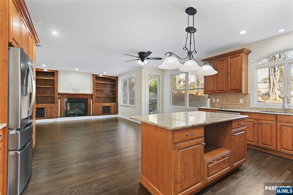 20 Grove Street Boonton, NJ 07005 - Photo 7 of 39 a large kitchen with stainless steel appliances granite countertop a stove and a sink