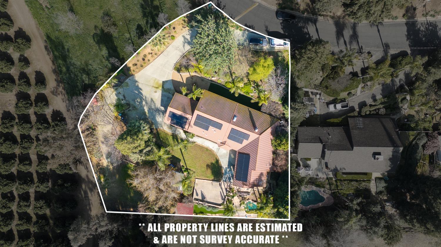 915 South Strathmore Avenue, Unit I Lindsay, CA 93247 - Photo 50 of 51 an aerial view of a house with a yard and garden