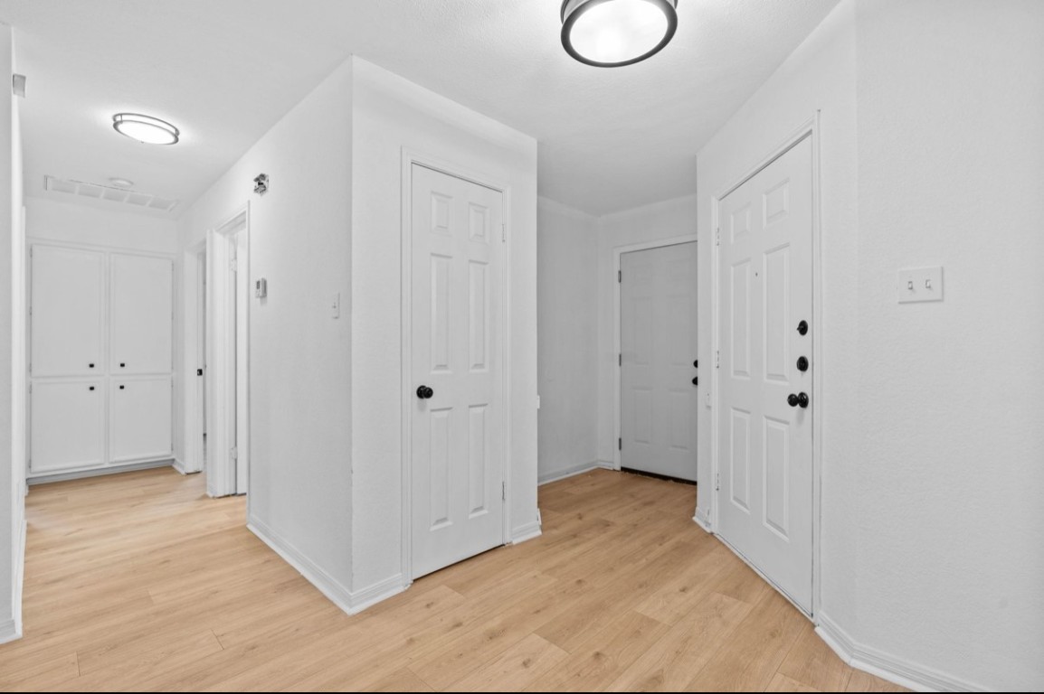 2101 Boxwood Path Round Rock, TX 78664 - Photo 7 of 22 a view of a room with wooden floor