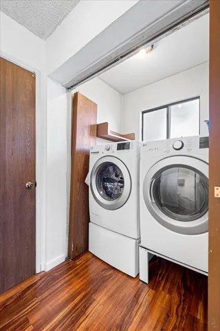 a utility room with dryer and washer