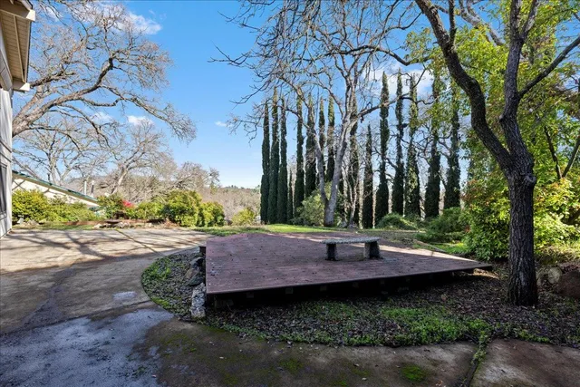 a view of a patio with a yard