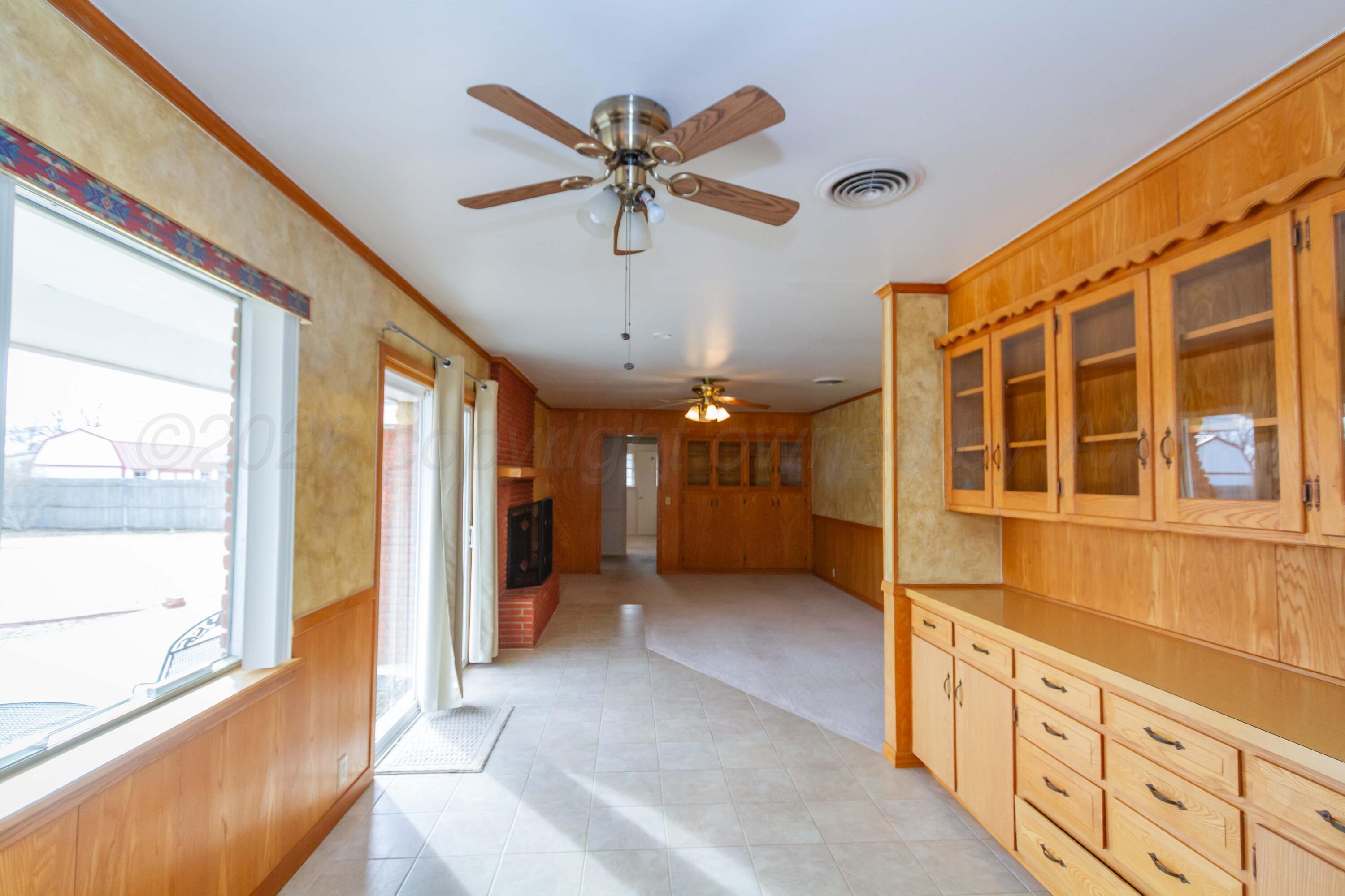 105 Wilson Street Claude, TX 79019 - Photo 14 of 31 a view of an entryway with a chandelier