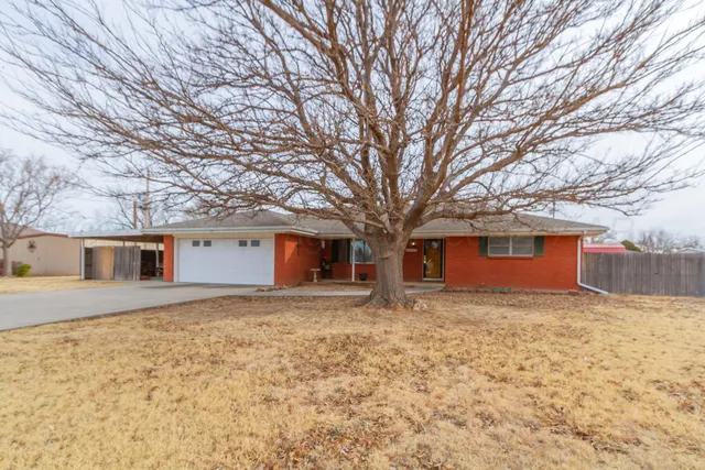 a house with trees in front of it