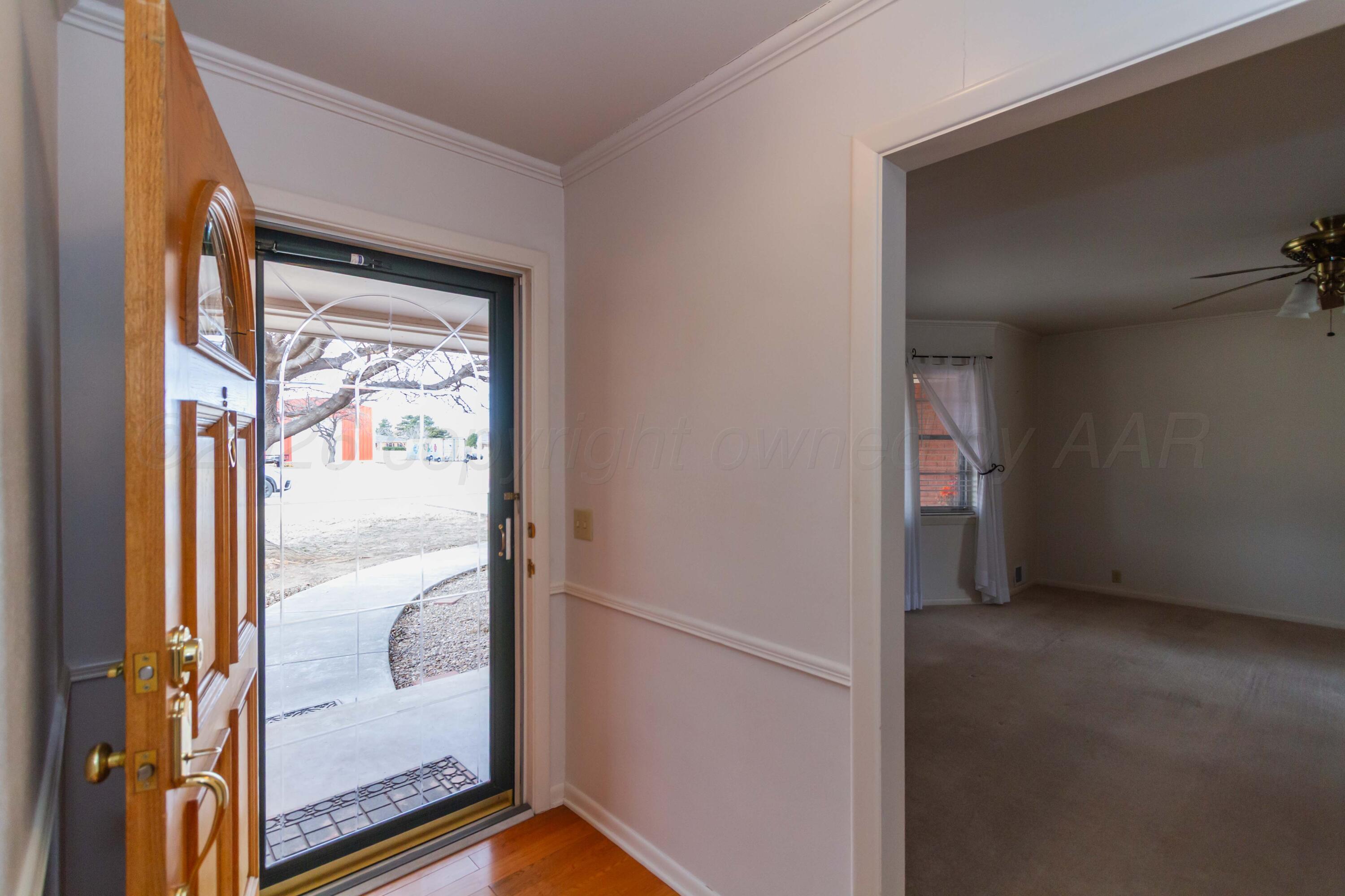 105 Wilson Street Claude, TX 79019 - Photo 3 of 31 a view of a front door