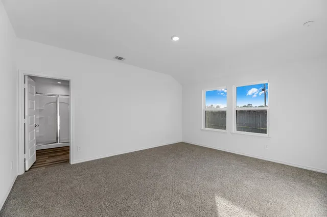 an empty room with a empty space and empty shelves