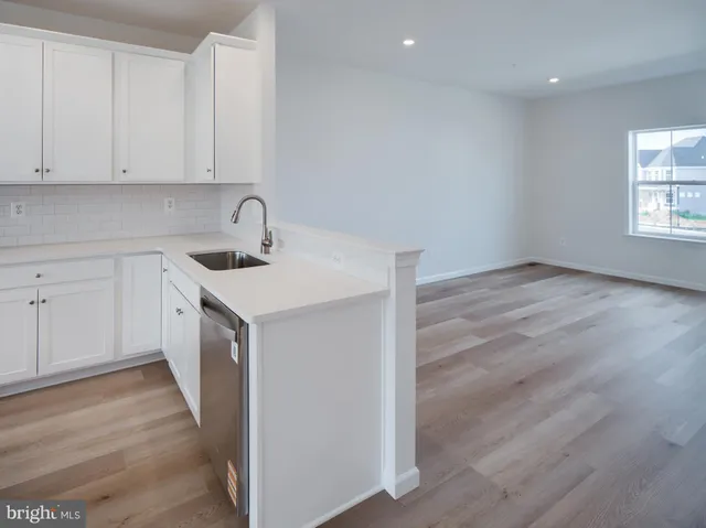 a view of a park with swings and slides