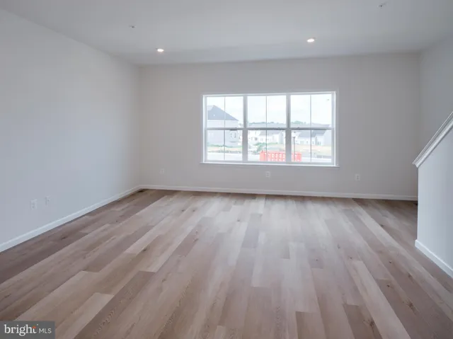 a picture of a bathroom with mirror gate