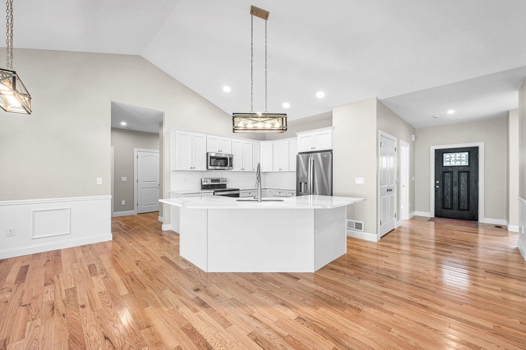 15 High Blf Road Belchertown, MA 01007 - Photo 15 of 41 a view of kitchen with kitchen island sink and refrigerator