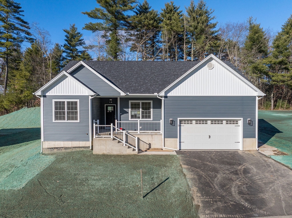 15 High Blf Road Belchertown, MA 01007 - Photo 2 of 41 a front view of a house with garden