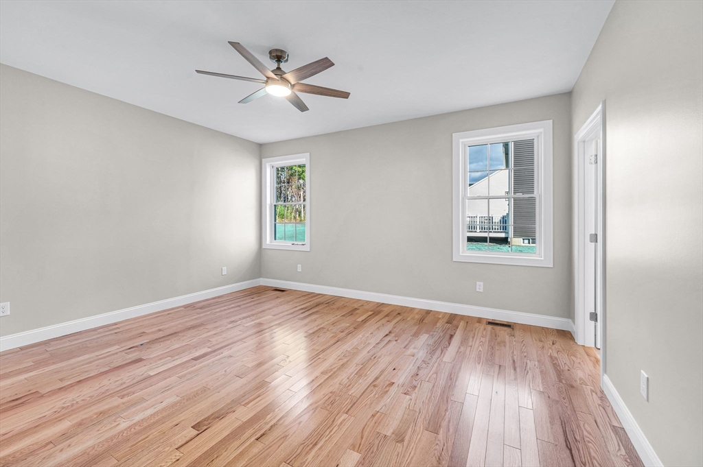 15 High Blf Road Belchertown, MA 01007 - Photo 21 of 41 wooden floor in an empty room with a window