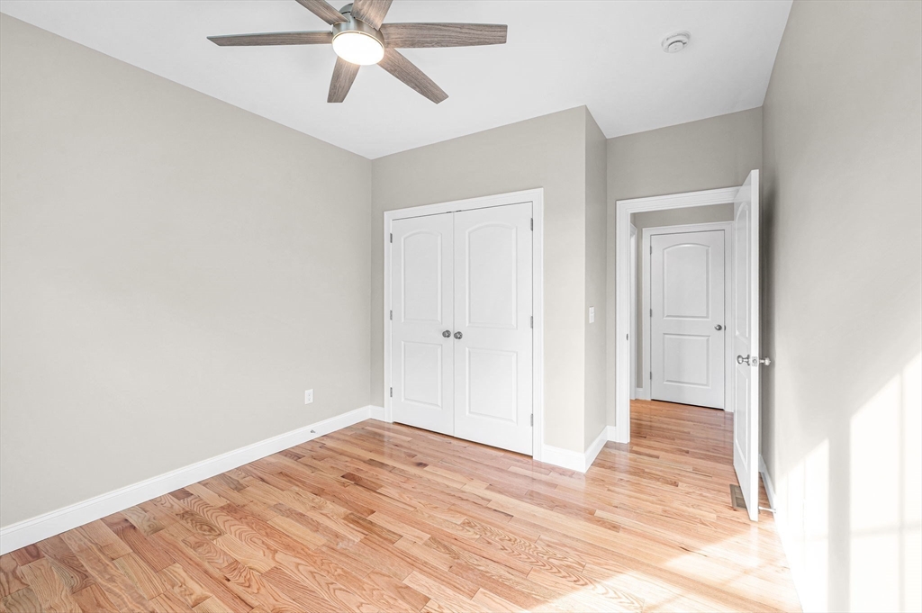 15 High Blf Road Belchertown, MA 01007 - Photo 29 of 41 a view of a room with wooden floor and ceiling fan