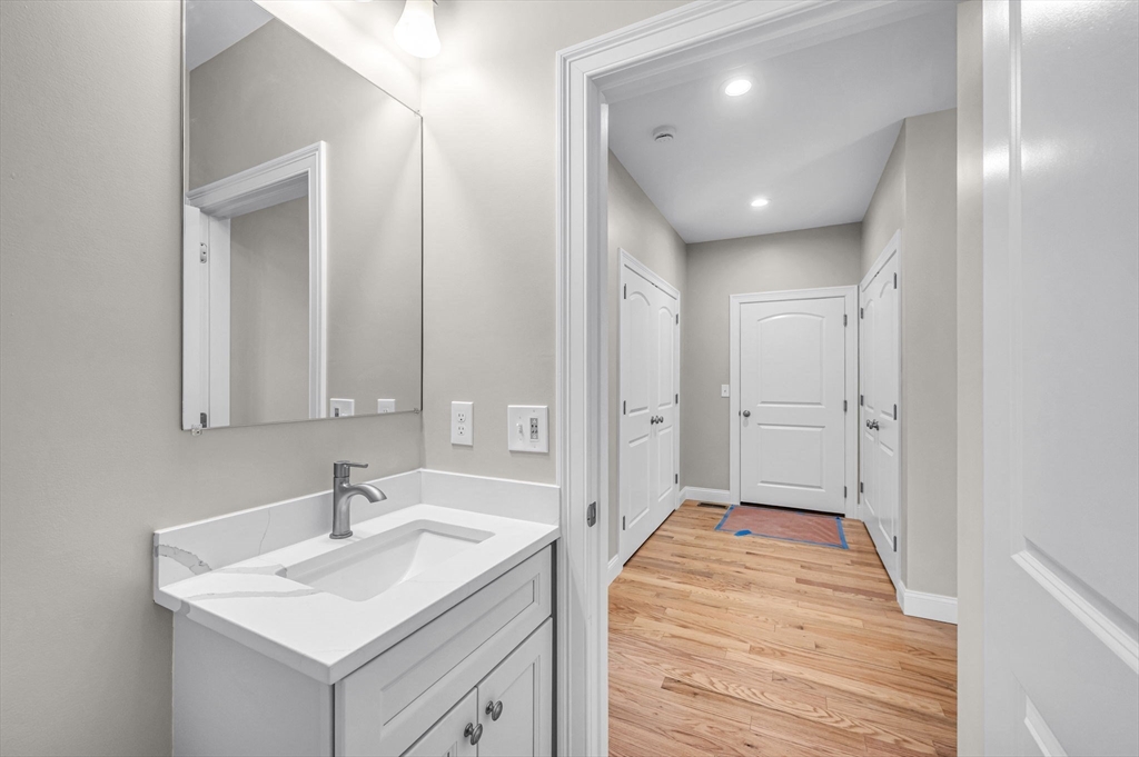 15 High Blf Road Belchertown, MA 01007 - Photo 35 of 41 a bathroom with a sink and mirror