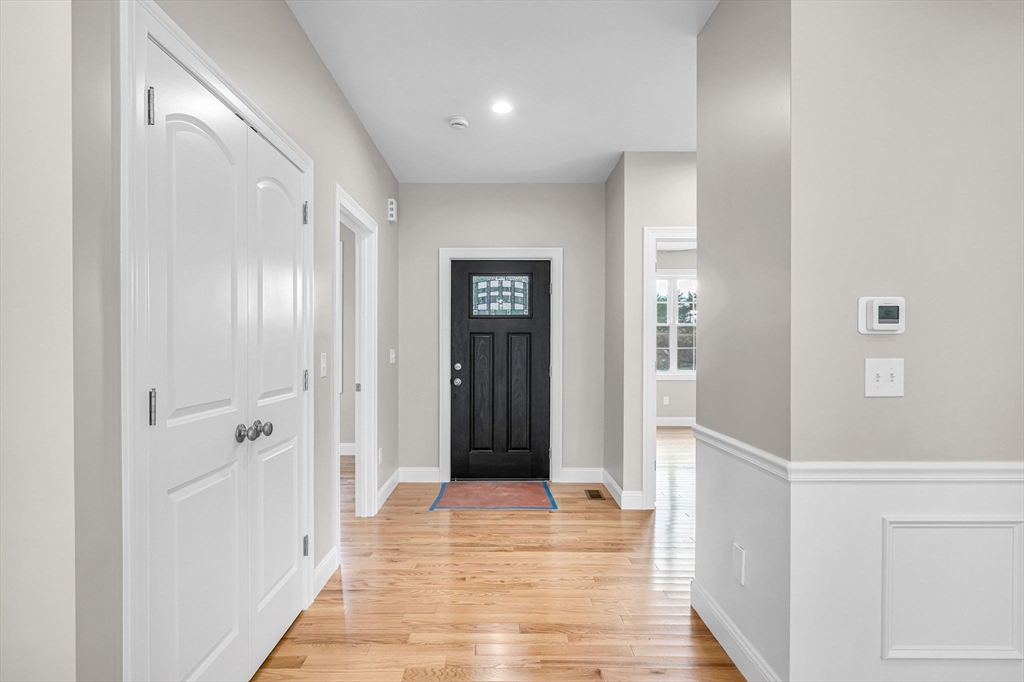 15 High Blf Road Belchertown, MA 01007 - Photo 5 of 41 a view of a hallway with wooden floor