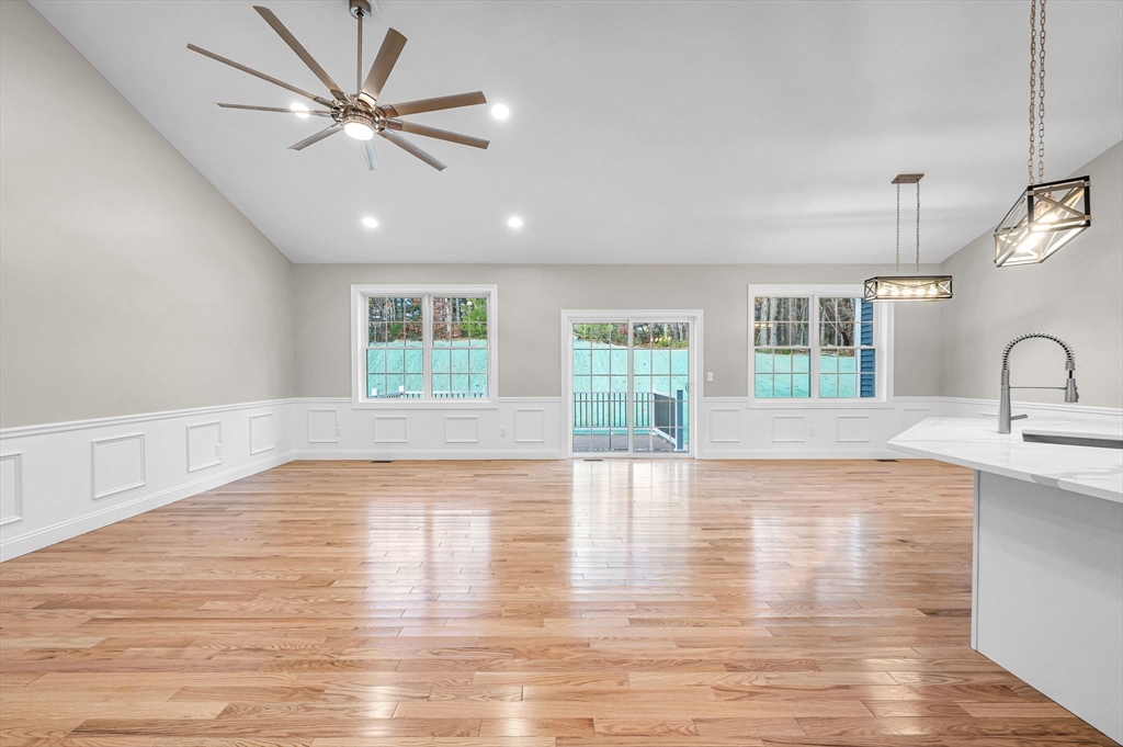 15 High Blf Road Belchertown, MA 01007 - Photo 8 of 41 a view of an empty room with window and wooden floor