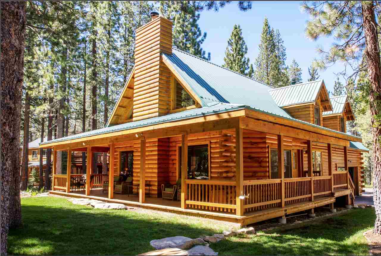 12051 Oslo Drive Truckee, CA 96161 - Photo 2 of 21 a view of a house with a yard and a garden