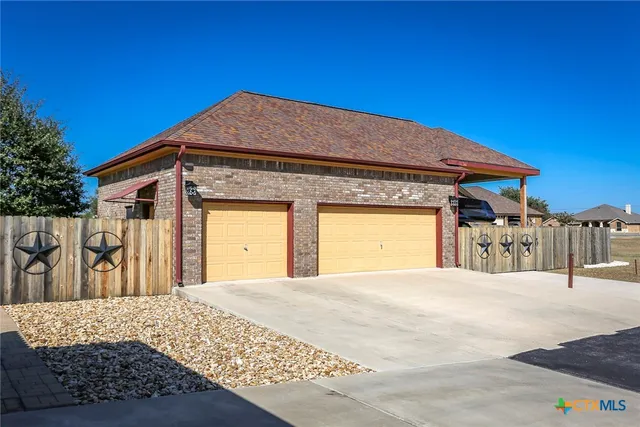 a front view of a house with a outdoor space