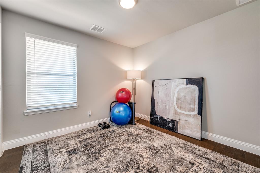 8977 George Cayley Lane Frisco, TX 75034 - Photo 15 of 24 Bonus room is open for your preference of office, workout, play or additional guest space.