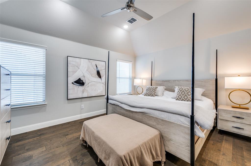 8977 George Cayley Lane Frisco, TX 75034 - Photo 19 of 24 Upstairs spacious bedroom with plenty of natural lighting