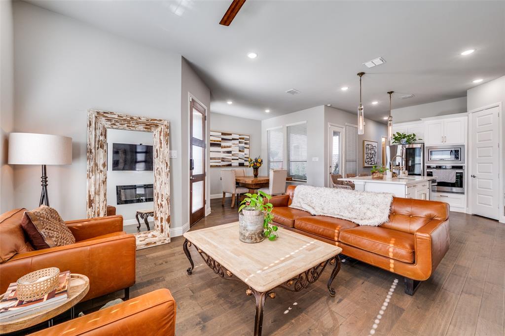 8977 George Cayley Lane Frisco, TX 75034 - Photo 6 of 24 Open concept seamlessly connects living with dining and kitchen spaces