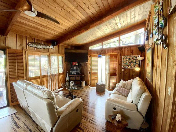 136 Palermo Drive Islamorada, FL 33036 - Photo 20 of 38 a living room with furniture and a large window