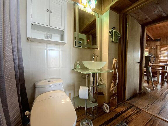 136 Palermo Drive Islamorada, FL 33036 - Photo 27 of 38 a bathroom with a sink toilet and shower