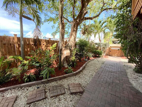 136 Palermo Drive Islamorada, FL 33036 - Photo 30 of 38 a view of a yard with plants