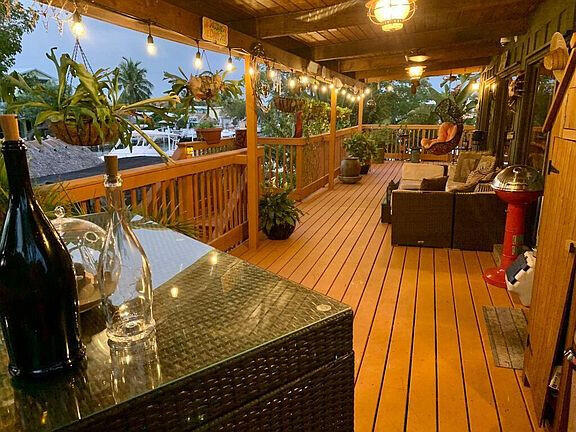 136 Palermo Drive Islamorada, FL 33036 - Photo 9 of 38 a view of a balcony with wooden floor