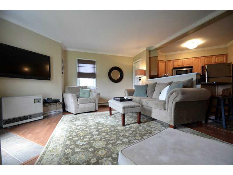64 Back Cove Estates Road, Unit 64 Portland, ME 04103 - Photo 5 of 18 Living Room.