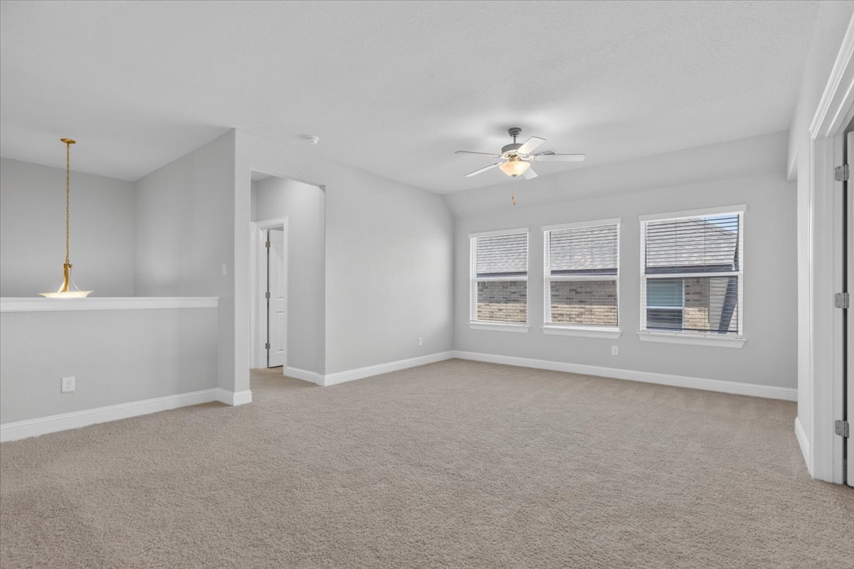 109 Rocky River Road Georgetown, TX 78628 - Photo 25 of 37 A well-lit upper-level space offers comfort and versatility, ideal for various living arrangements.