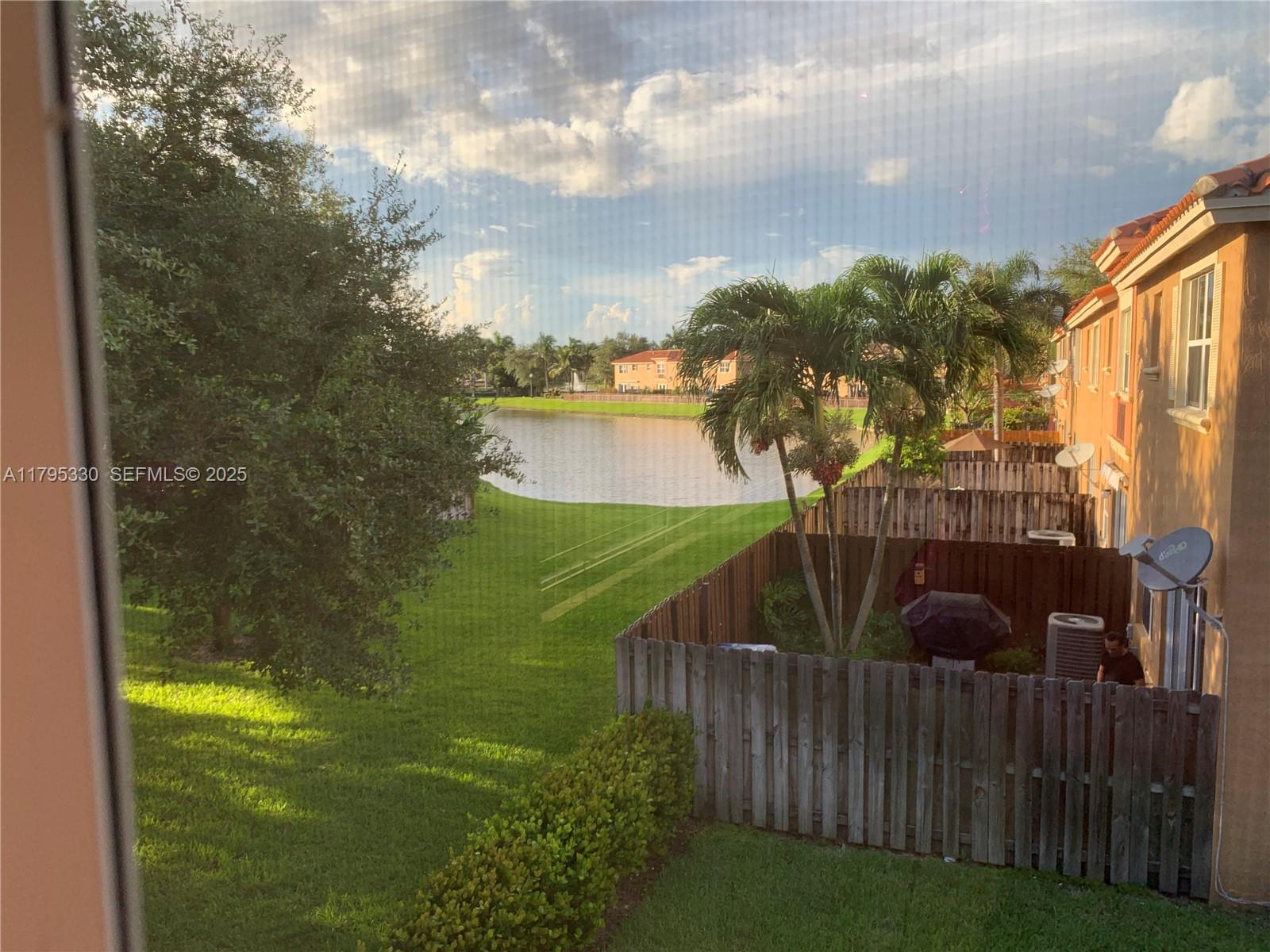 3150 Southwest 152nd Place Miami, FL 33185 - Photo 27 of 47 a view of a garden from a balcony