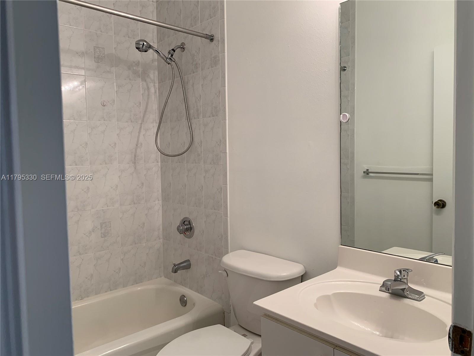 3150 Southwest 152nd Place Miami, FL 33185 - Photo 36 of 47 a bathroom with a sink toilet and shower