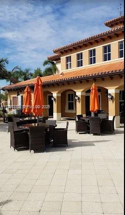 3150 Southwest 152nd Place Miami, FL 33185 - Photo 39 of 47 a view of house with yard outdoor seating