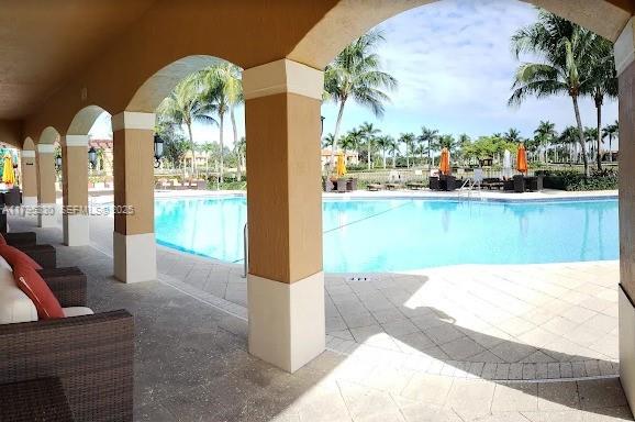3150 Southwest 152nd Place Miami, FL 33185 - Photo 43 of 47 a picture of a floor to ceiling window and an ocean view