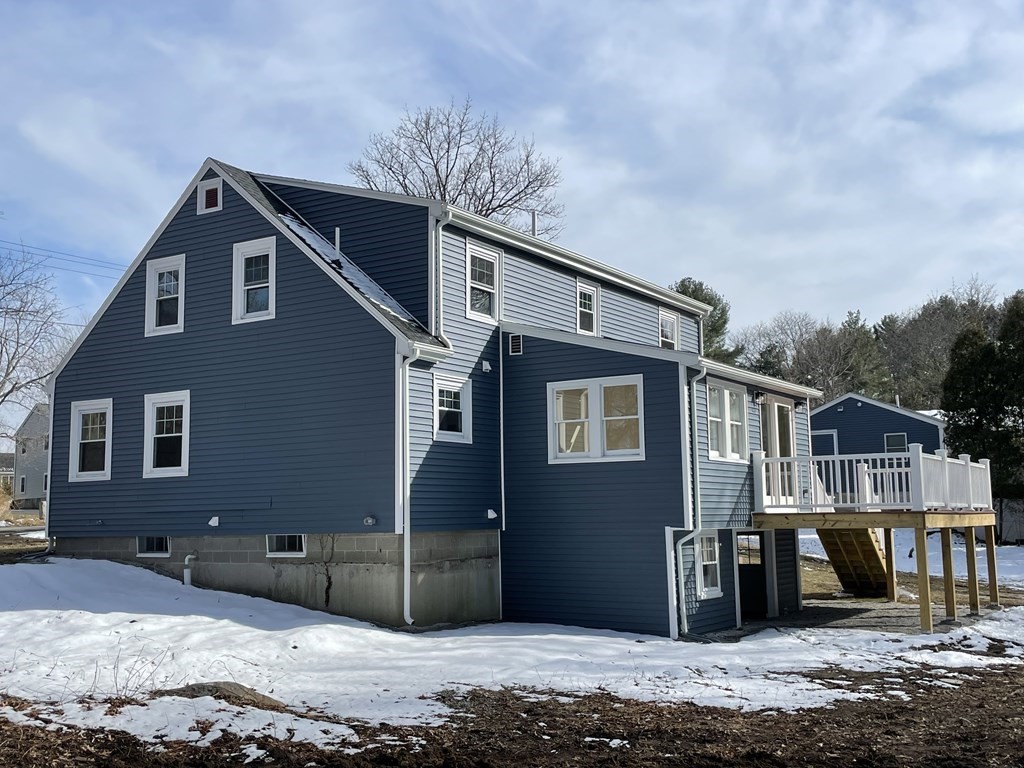 28 Chamberlain Road Chelmsford, MA 01824 - Photo 1 of 38 a front view of a house with a yard