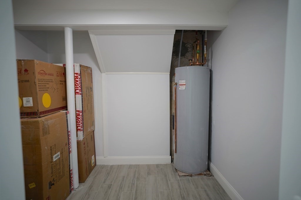 28 Chamberlain Road Chelmsford, MA 01824 - Photo 35 of 38 a view of hallway with wooden floor