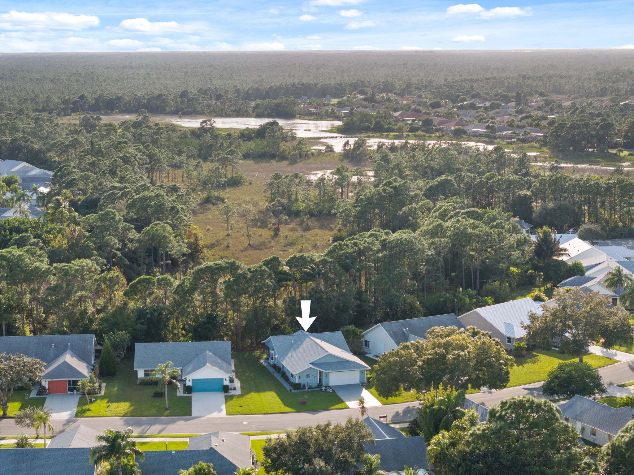 3822 Southeast Canvasback Place Stuart, FL 34997 - Photo 11 of 38 an aerial view of residential houses with outdoor space