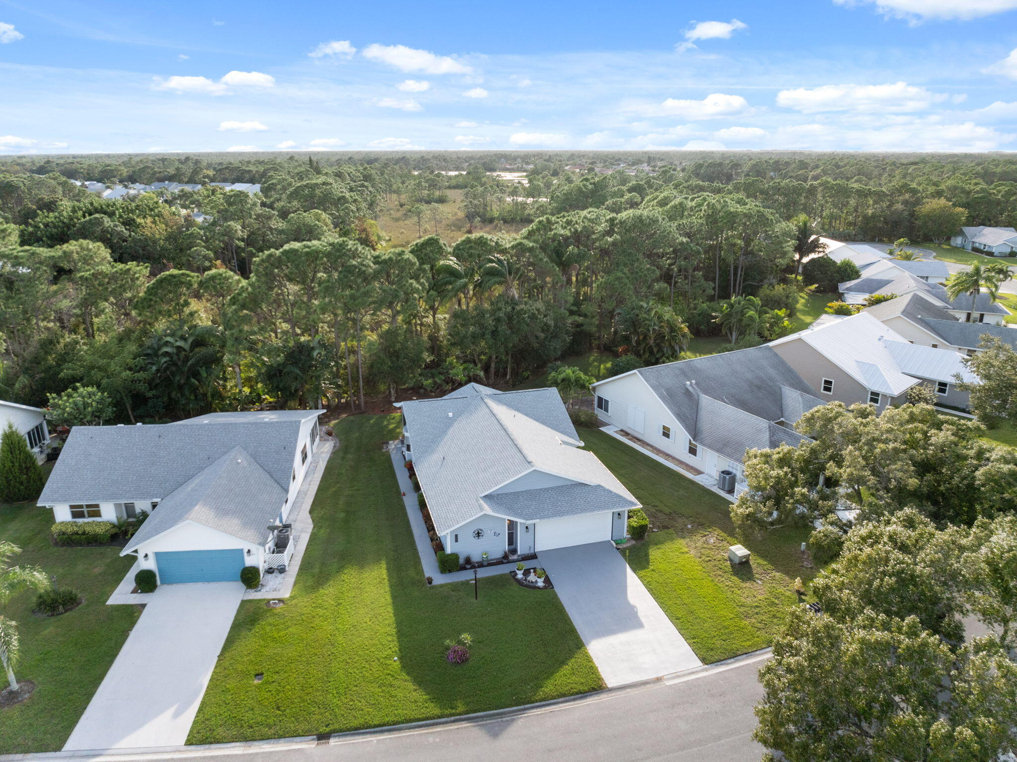 3822 Southeast Canvasback Place Stuart, FL 34997 - Photo 12 of 38 an aerial view of house with yard