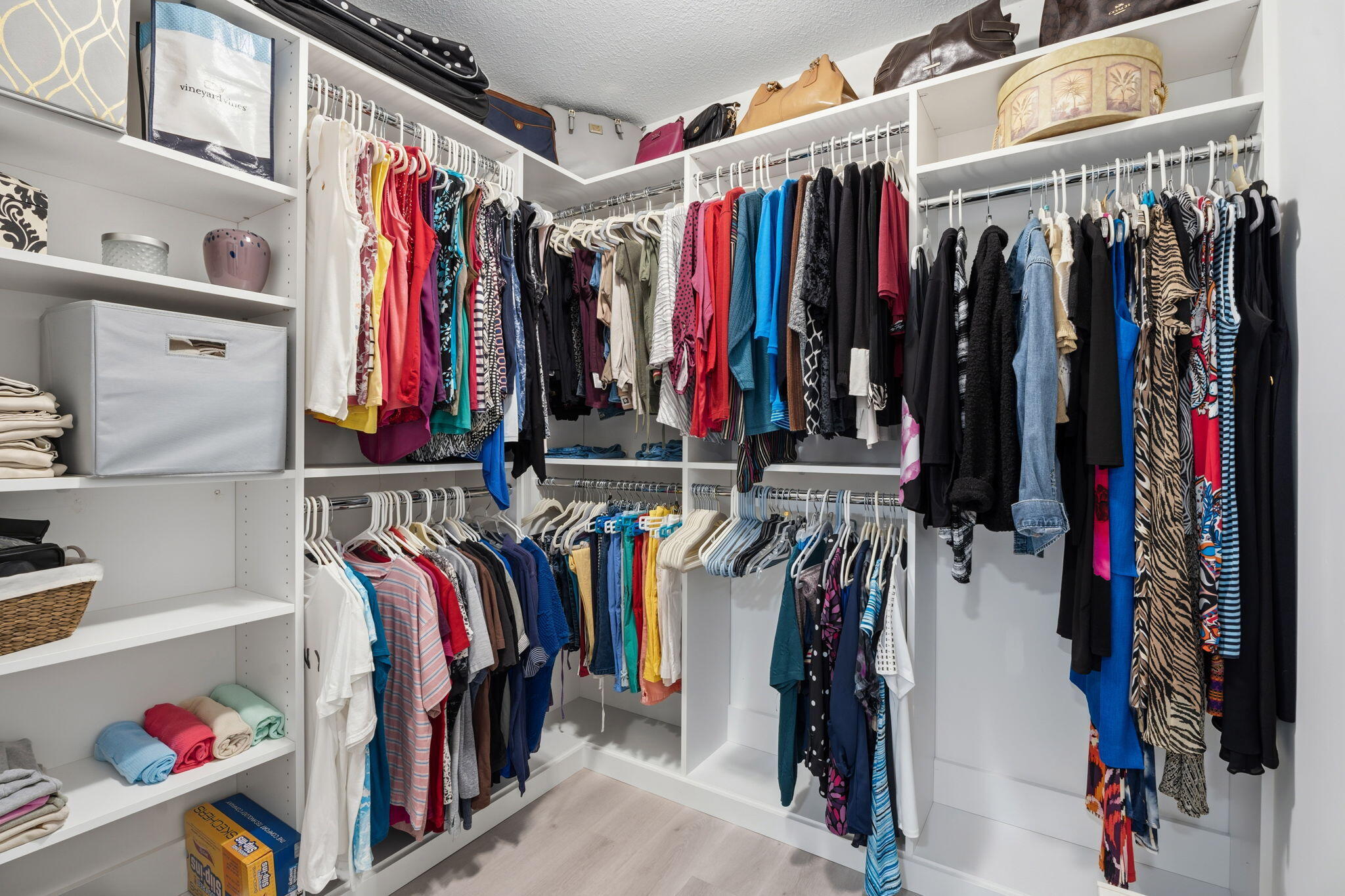 3822 Southeast Canvasback Place Stuart, FL 34997 - Photo 26 of 38 a view of walk in closet with clothes