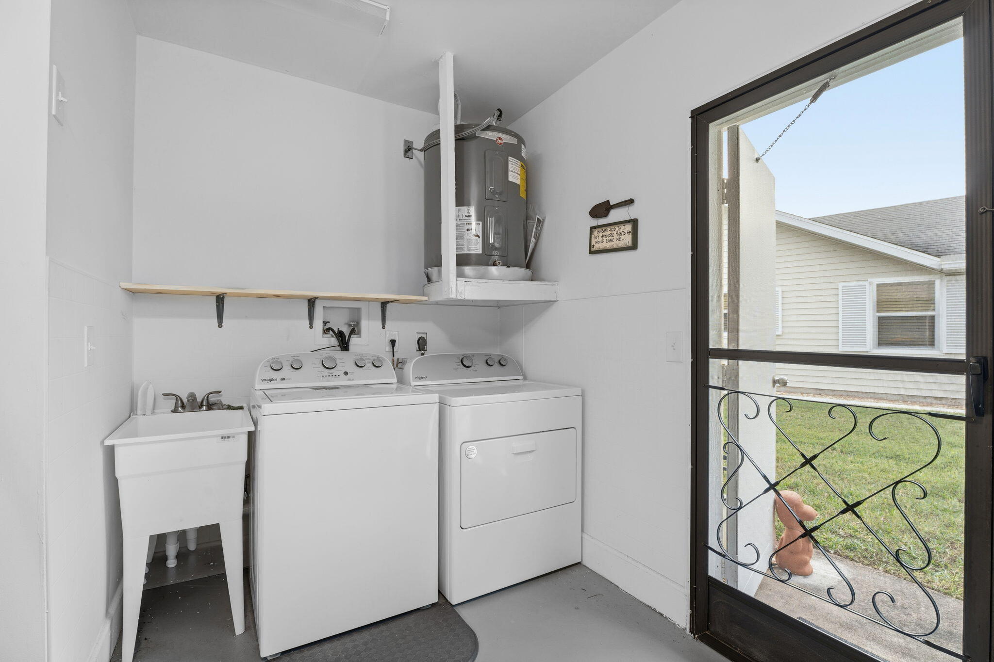 3822 Southeast Canvasback Place Stuart, FL 34997 - Photo 35 of 38 a bathroom with a sink and a mirror