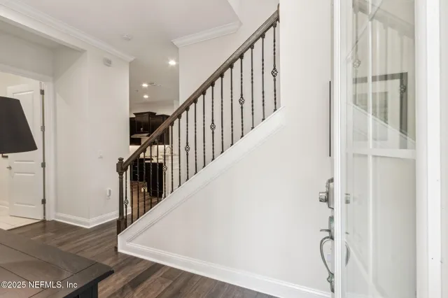 a view of entryway with wooden floor